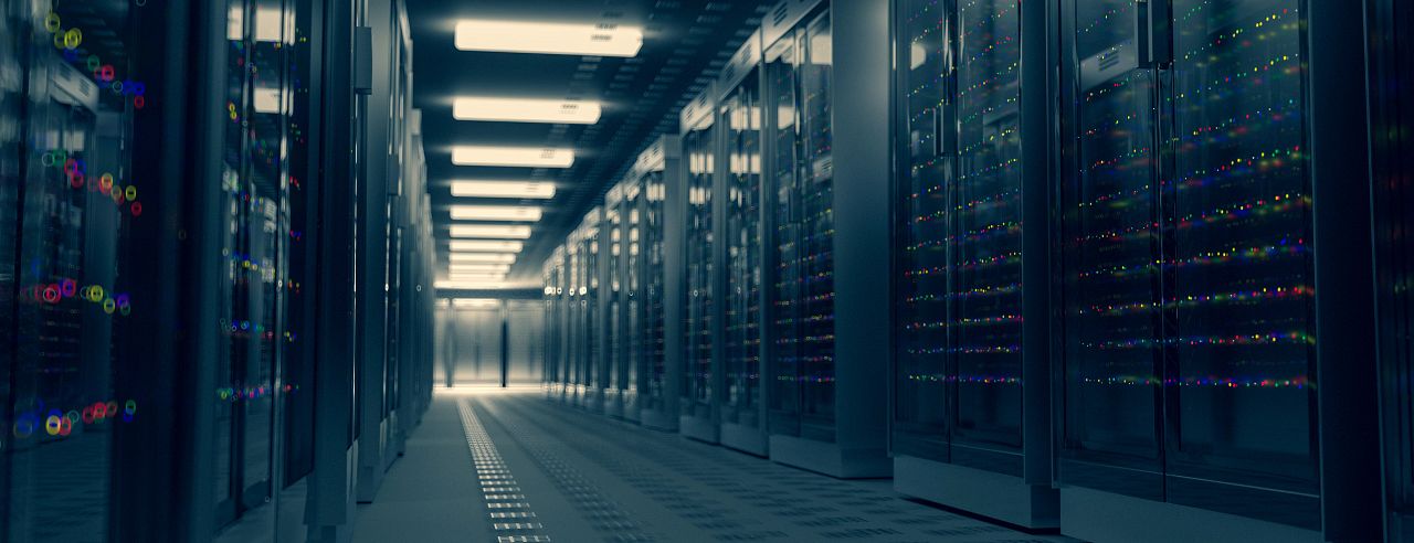 High-density server cabinets in a climate-controlled data center facility.